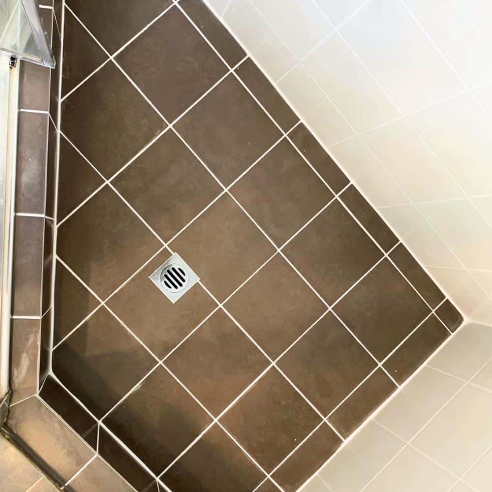 Brown angle shower floor after